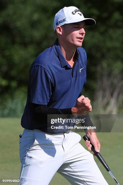 Aaron Wise reacts following his birdie putt on the eighth green during the second round of the AT&T Byron Nelson at Trinity Forest Golf Club on May...