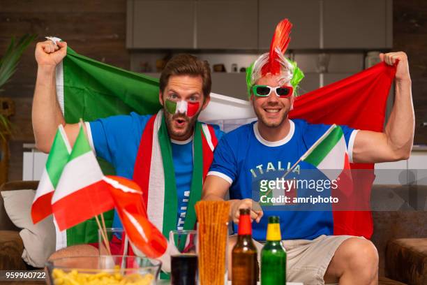 two real soccer fans supporting italy - italy football stock pictures, royalty-free photos & images