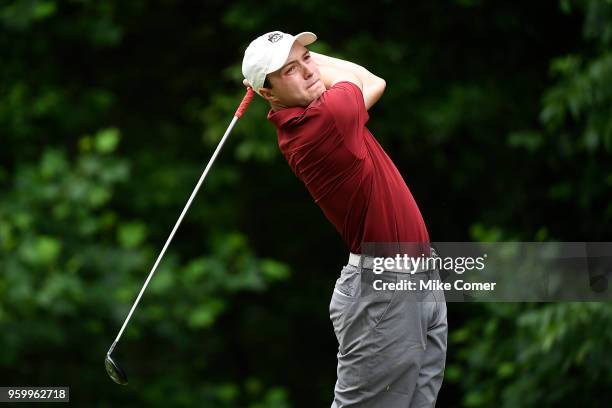 Zach Evens of Guilford College tees off on the fifth hole during the Division III Men's Golf Championship held at the Grandover Resort on May 18,...