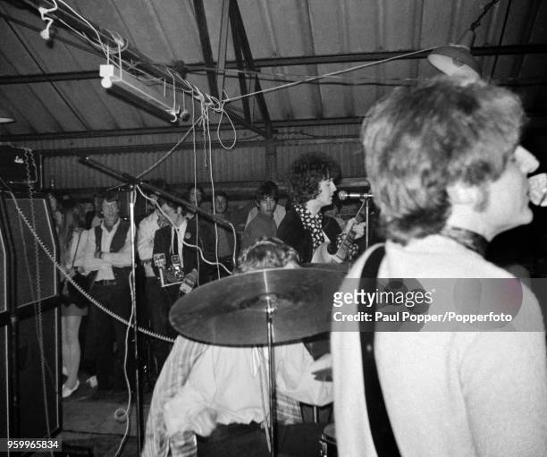 View of English rock band Cream performing live on stage at the Barbeque 67 music festival at the Tulip Bulb Auction Hall in Spalding, Lincolnshire...