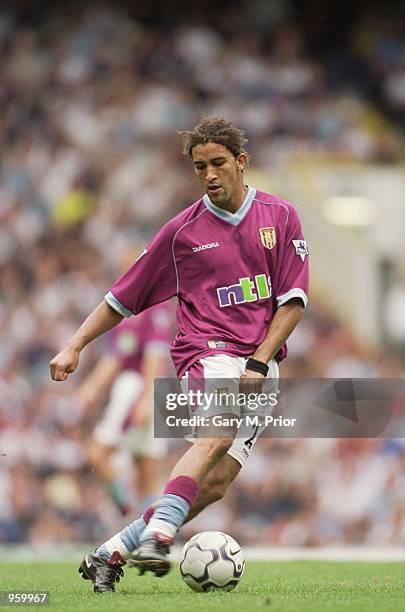 Moustapha Hadji of Aston Villa in action during the FA Barclaycard Premiership match against Tottenham Hotspur played at White Hart Lane in London....