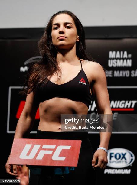 Veronica Macedo of Venezuela poses on the scale during the UFC Fight Night weigh-in at Movistar Arena on May 18, 2018 in Santiago, Chile.