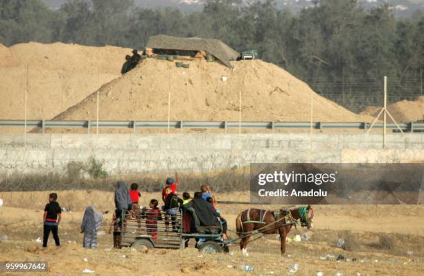 Palestinians stage a demonstration, on the 8th week of the "Great March of Return", at Gaza-Israel border in eastern Rafah, Gaza on May 18, 2018.