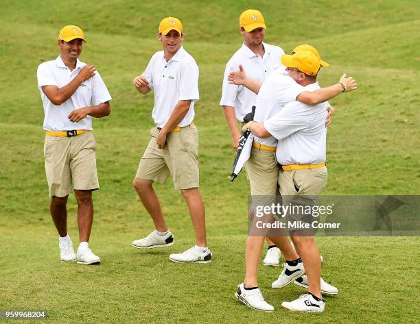 The Methodist University Men's Golf team celebrate their first place finish following the Division III Men's Golf Championship held at the Grandover...