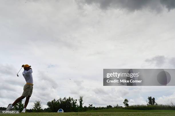 Jared Chinn of Methodist University tees off on hole sixteen during the Division III Men's Golf Championship held at the Grandover Resort on May 18,...