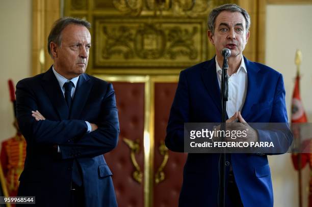 The former president of Spanish government Jose Luis Rodriguez Zapatero speaks to the press next to the former president of the French Senate...