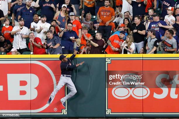 Greg Allen of the Cleveland Indians catches a fly ball hit by Alex Bregman of the Houston Astros in the first inning at Minute Maid Park on May 18,...