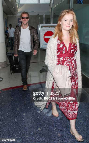 James Van Der Beek and his wife Kimberly Brook are seen on May 18, 2018 in Los Angeles, California.