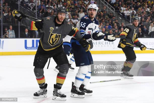 Mark Scheifele of the Winnipeg Jets reacts after being called for a slashing penalty against Brayden McNabb of the Vegas Golden Knights during the...