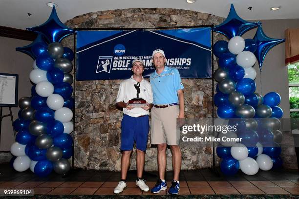 Brian Peccie of Washington & Lee poses with the champion's trophy after winning the Division III Men's Golf Championship held at the Grandover Resort...