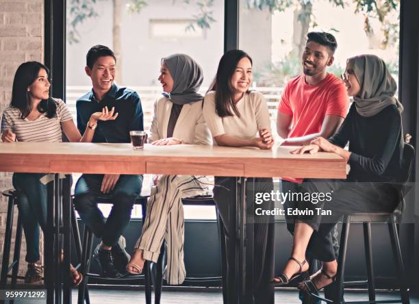 young adults friends gathering at cafe - asian discussion stock pictures, royalty-free photos & images