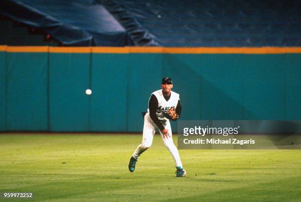Gary Sheffield of the Florida Marlins throws the ball back to the infield during Game 7 of the 1997 World Series against the Cleveland Indians at Pro...