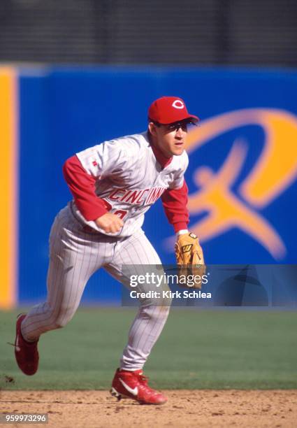 Brett Boone of the Cincinnati Reds fields a ground ball during the game against the San Diego Padres at Qualcomm Stadium on April 7, 1998.