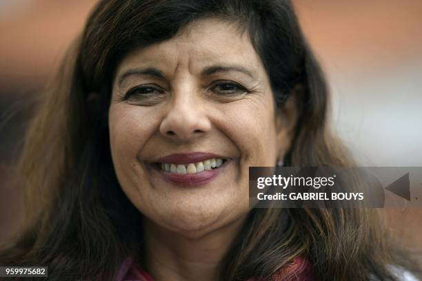 Venezuelan Maria Argelia Jaspe Alvarez poses in Madrid on May 14, 2018 - Exiled Venezuelans have no expectations of the presidential election taking...