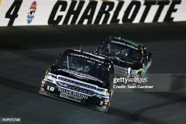 John Hunter, driver of the Fleetwing/D.A.B. Contructors Chevrolet, leads Brett Moffitt, driver of the Ibaraki Toyopet Toyota, during the NASCAR...