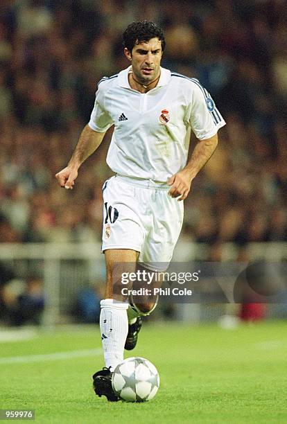 Luis Figo of Real Madrid on the ball during the UEFA Champions League match between Real Madrid and Roma played at the Estadio de Bernabeu in Madrid,...