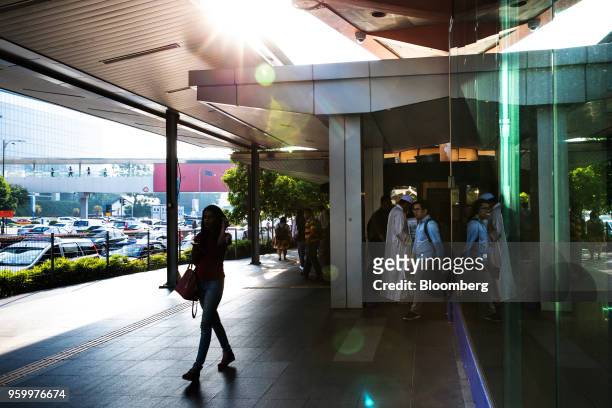 People exit Ampang Park station, operated by Rapid Rail Sdn Bhd., in Kuala Lumpur, Malaysia, on Friday, May 18, 2018. Malaysian Prime...
