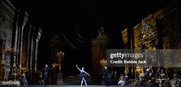 Marianela Nunez as Odette/Odile, Vadim Muntagirov as Prince Siegfried and Bennet Gartside as von Rothbart with artists of the company in Liam...