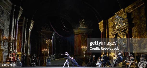 Marianela Nunez as Odette/Odile and Vadim Muntagirov as Prince Siegfried with artists of the company in Liam Scarlett"s adaptation of Marius Petipa...