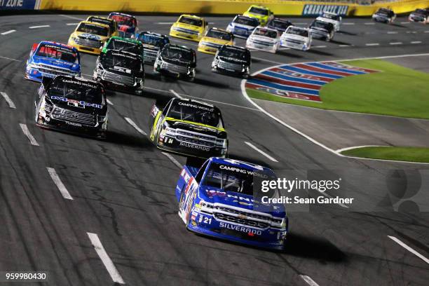 Johnny Sauter, driver of the ISM Connect Chevrolet, leads a pack of trucks during the NASCAR Camping World Truck Series North Carolina Education...