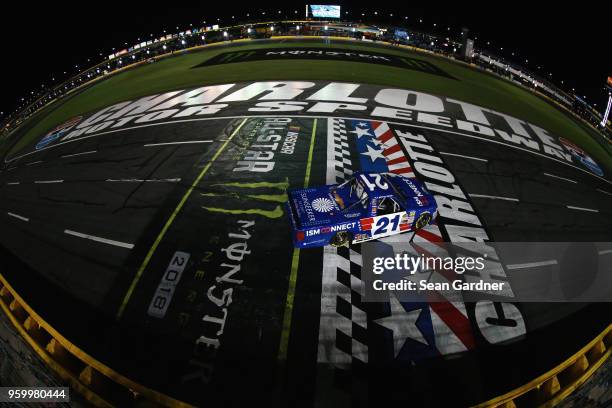 Johnny Sauter, driver of the ISM Connect Chevrolet, celebrates with the checkered flag after winning the NASCAR Camping World Truck Series North...