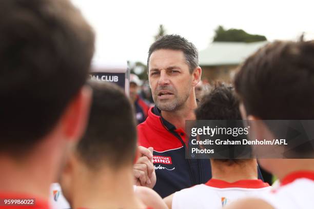 Casey Demons Head Coach Jade Rawlings talks to his players during the VFL round seven match between Frankston and Casey at Skybus Stadium on May 19,...
