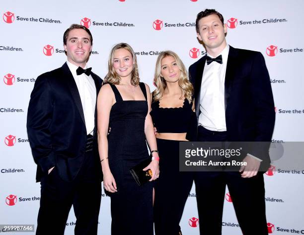 Tyler Carbone, Emma Olcott, Annabelle Kirk and Eric Spielvogel Attend the Save the Children Young Patron's Galaat Central Park Zoo on May 18, 2018 in...
