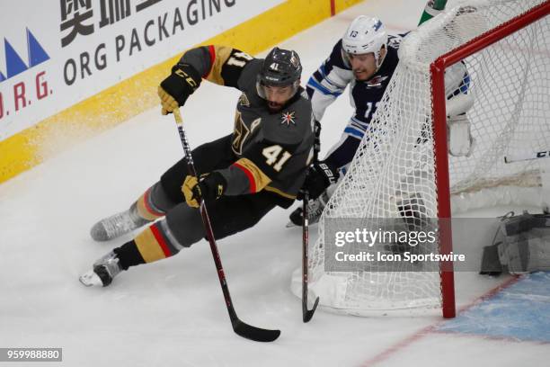 Vegas Golden Knights left wing Pierre-Edouard Bellemare looks to take a shot around the post during Game Four of the Western Conference Finals of the...