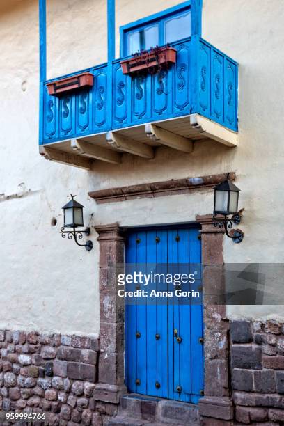 detail of vibrant blue doors and balcony in historic cusco city, peru - anna gorin stock pictures, royalty-free photos & images