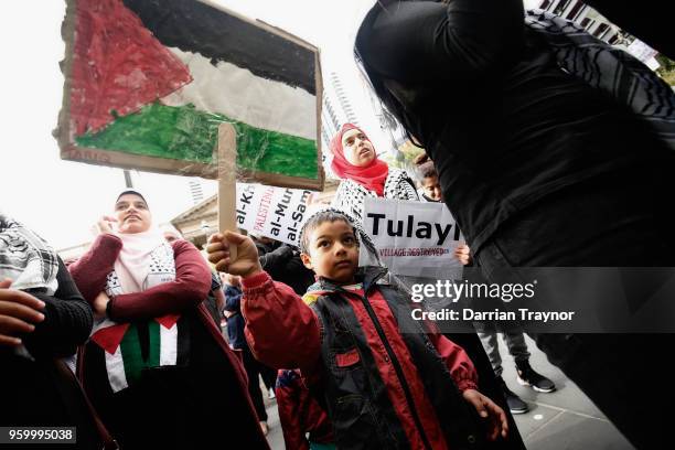 Activists march to commemorate the 70th anniversary of Nakba Day on May 19, 2018 in Melbourne, Australia.