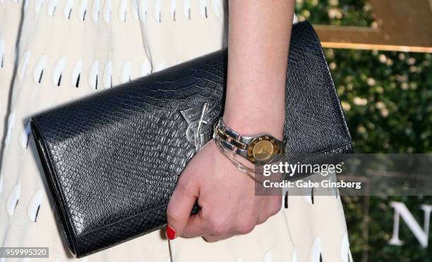 Marcelle Braga, purse, watch detail, attends Vegas magazine's 15th anniversary party at the Red Rock Casino, Resort and Spa on May 18, 2018 in Las...