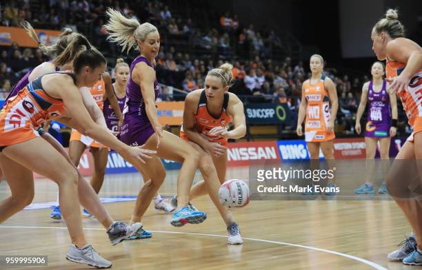 Jo Harten of the Giants passes to Susan Pettitt of the giants during the round four Super Netball match between the Giants and the Firebirds at Quay...