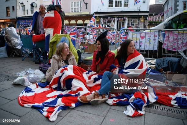 Royal fans wake and prepare themselves, as media, tourists and royal fans gather near Windsor Castle, on the day of the wedding of Prince Harry and...