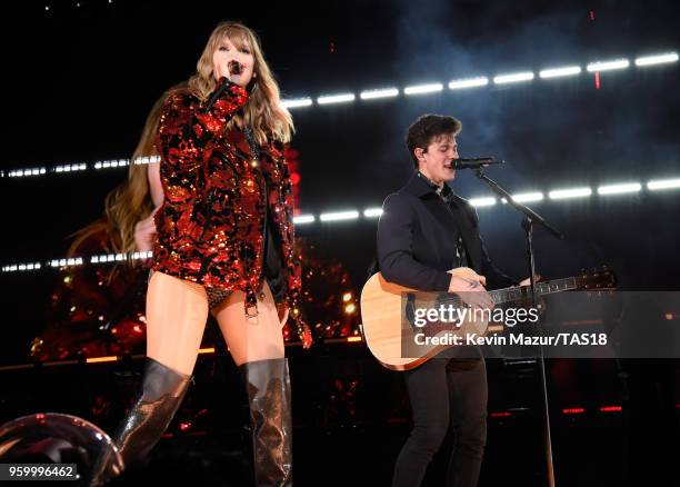Taylor Swift and Shawn Mendes perform onstage during the Taylor Swift reputation Stadium Tour at the Rose Bowl on May 18, 2018 in Pasadena,...