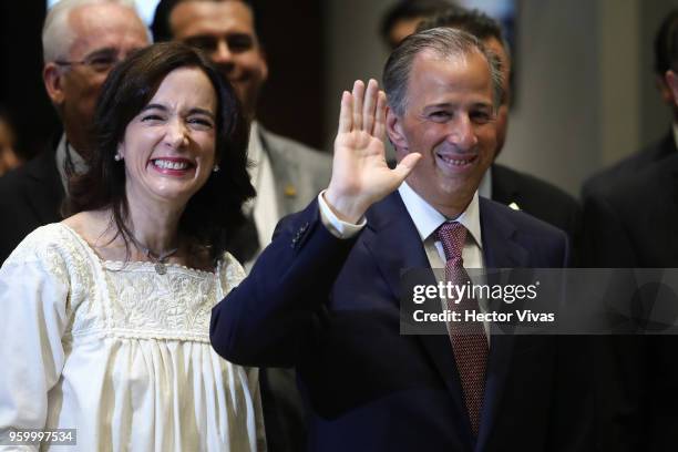 Jose Antonio Meade presidential candidate for the Coalition All For Mexico and his wife Juana Cuevas smiles for pictures prior a conference as part...