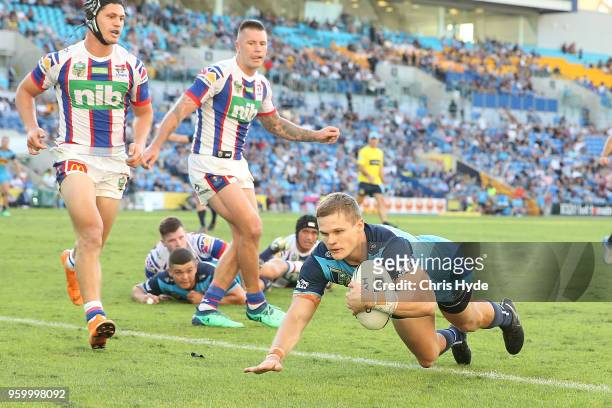 Dale Copley of the Titans dives to score a try during the round 11 NRL match between the Gold Coast Titans and the Newcastle Knights at Cbus Super...