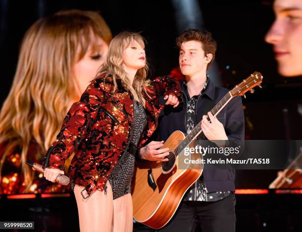 Taylor Swift and Shawn Mendes perform onstage during the Taylor Swift reputation Stadium Tour at the Rose Bowl on May 18, 2018 in Pasadena,...