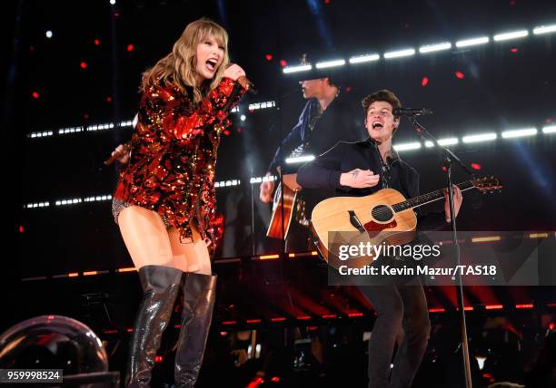 Taylor Swift and Shawn Mendes perform onstage during the Taylor Swift reputation Stadium Tour at the Rose Bowl on May 18, 2018 in Pasadena,...