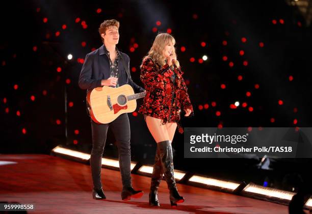 Shawn Mendes and Taylor Swift perform onstage during the Taylor Swift reputation Stadium Tour at the Rose Bowl on May 18, 2018 in Pasadena,...