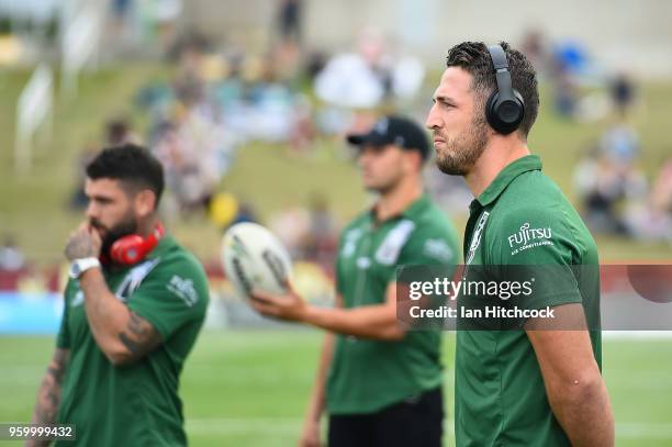 Sam Burgess of the Rabbitohs looks on before the start of the round 11 NRL match between the North Queensland Cowboys and the South Sydney Rabbitohs...