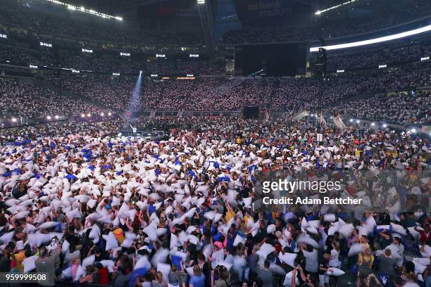 An estimated crowd of 50,000 attempts the Guinness World record pillow fight at Pulse Twin Cities at U.S. Bank Stadium on May 18, 2018 in...