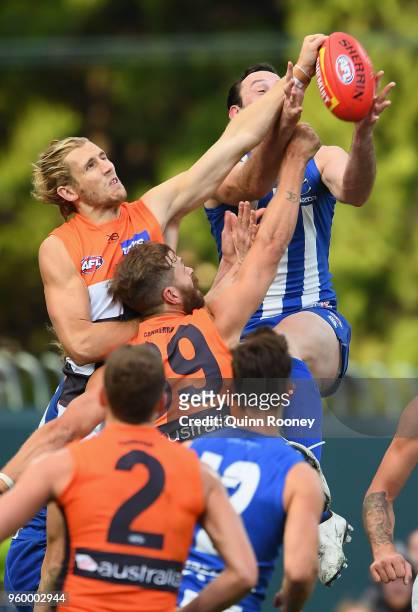 Todd Goldstein of the Kangaroos marks infront of Nick Haynes of the Giants during the round nine AFL match between the North Melbourne Kangaroos and...