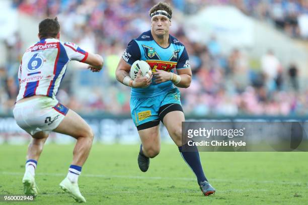 Jarrod Wallace of the Titans runs the ball during the round 11 NRL match between the Gold Coast Titans and the Newcastle Knights at Cbus Super...