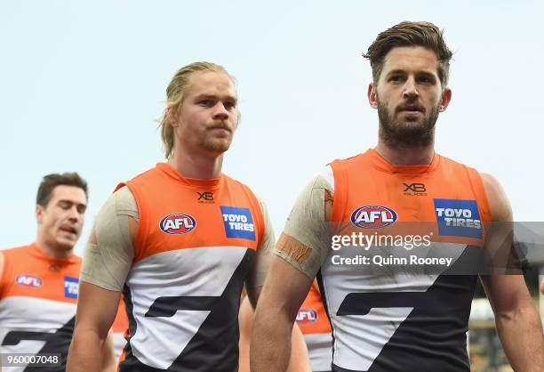 Callan Ward of the Giants looks dejected after losing the round nine AFL match between the North Melbourne Kangaroos and the Greater Western Sydney...