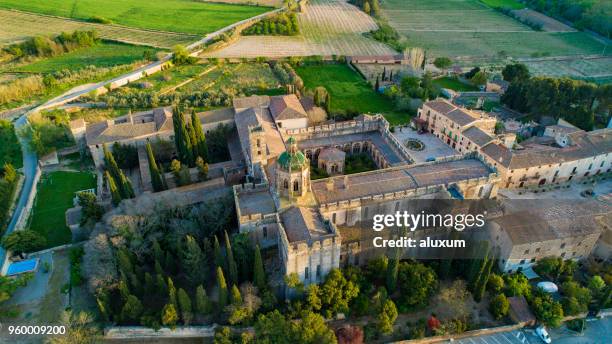 aerial view of the monastery of santes creus. completed in 1225 it is one of the most important cistercian monasteries in catalonia. in 1835 the monks left the monastery and was declared a national monument in 1921 - tarragona stock pictures, royalty-free photos & images