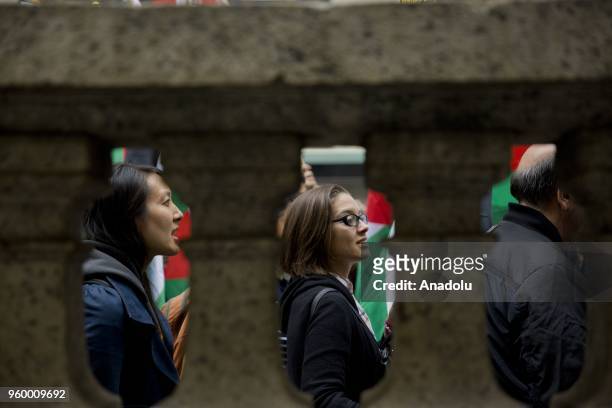 Activists stage a rally condemning the Israeli violence at the Gaza Strips eastern border on May 14, 2018 in iconic tourism attraction Times Squares...