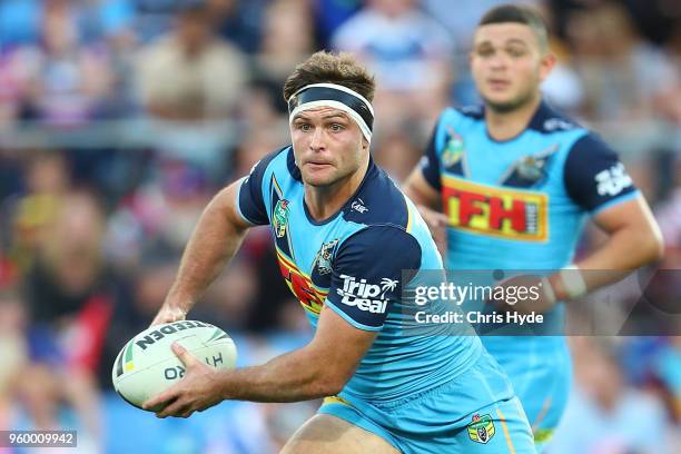 Mitchell Rein of the Titans runs the ball during the round 11 NRL match between the Gold Coast Titans and the Newcastle Knights at Cbus Super Stadium...