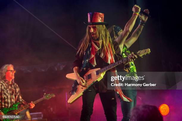 Bret Michaels and C.C. DeVille of the band Poison perform at Five Points Amphitheatre on May 18, 2018 in Irvine, California.