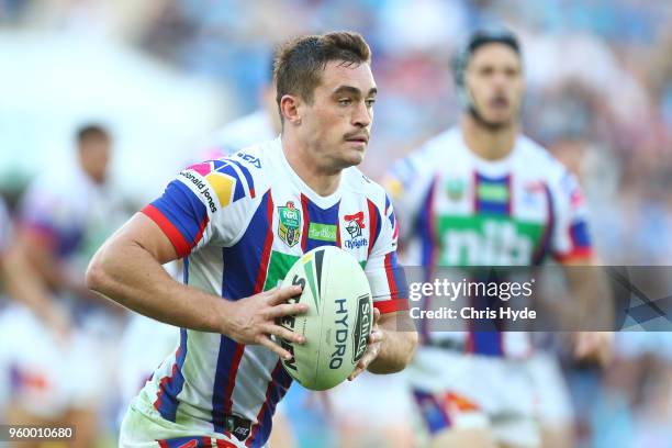 Connor Watson of the Knights runs the ball during the round 11 NRL match between the Gold Coast Titans and the Newcastle Knights at Cbus Super...