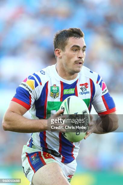 Connor Watson of the Knights runs the ball during the round 11 NRL match between the Gold Coast Titans and the Newcastle Knights at Cbus Super...